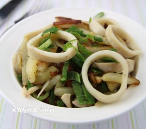 Fried potatoes with squid. Bon Appetit. ?>