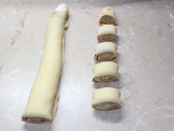 Cinnabon buns We twist it into a tight roll and cut it. ?>