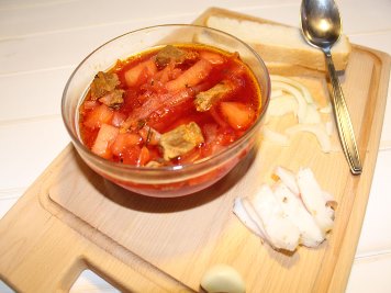 Borscht Pour the prepared borsch into plates, add sour cream and sprinkle with herbs. Enjoy your meal. ?>
